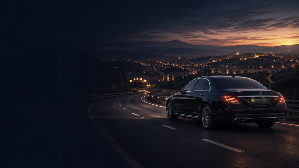Mercedes on a highway at dusk for long-distance transfers
